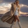 Luxury camel maxi faux fur coat with oversized hood for festival and rave wear.
