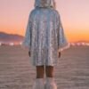 ZEVQ premium silver sequin hooded poncho coat with faux fur hood and cuffs for festival fashion