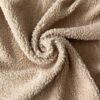 Men's faux suede hooded kaftan duster in beige, featuring a thick plush fur lining and dramatic nomadic silhouette for festival wear.