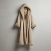 Men's faux suede hooded kaftan duster in beige, featuring a thick plush fur lining and dramatic nomadic silhouette for festival wear.