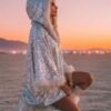 ZEVQ premium silver sequin hooded poncho coat with faux fur hood and cuffs for festival fashion