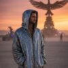 ZEVQ's premium Silver Iridescent Festival Jacket - a holographic sequin zip-up hoodie for festivals and raves.