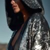 ZEVQ Silver Sequin Hooded Duster custom print maxi coat creating a liquid metal effect at a festival