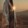 ZEVQ's premium silver sequin maxi duster hoodie, a festival statement coat with black satin lining.