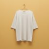 ZEVQ premium oversize boho festival t-shirt in off-white, modeled for desert festival wear.