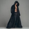 Custom faux fur duster, a black hooded maxi robe for festival fashion and luxury lounging.