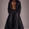Custom faux fur duster, a black hooded maxi robe for festival fashion and luxury lounging.