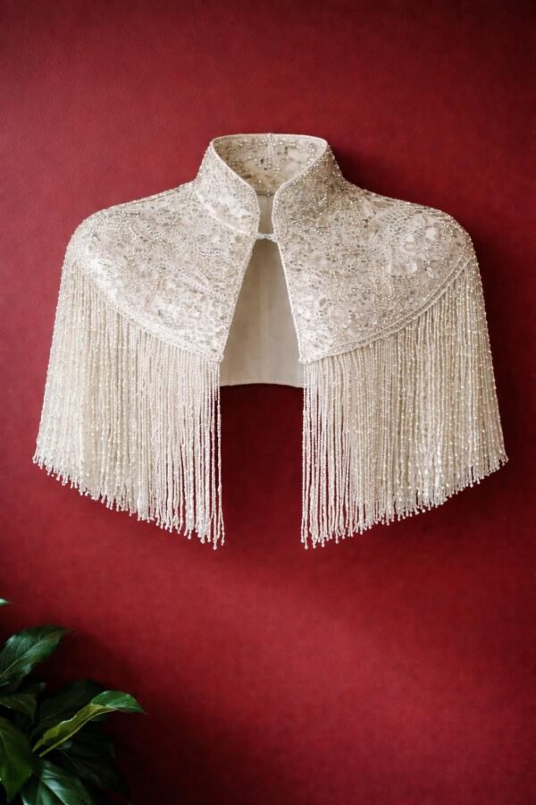 ZEVQ custom sequin bridal cape with beaded fringe, a luxury wedding shrug for brides and performers.