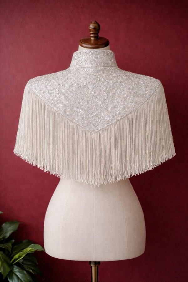 ZEVQ custom sequin bridal cape with beaded fringe, a luxury wedding shrug for brides and performers.