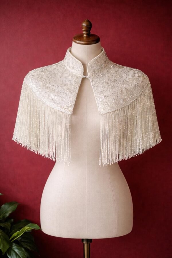ZEVQ custom sequin bridal cape with beaded fringe, a luxury wedding shrug for brides and performers.