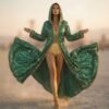 ZEVQ Emerald Green Sequin Hooded Duster Coat flowing in the desert wind at a festival