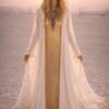 ZEVQ's premium French lace hooded duster coat with gold trim, a Burning Man festival kimono, worn in a desert landscape.
