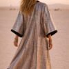ZEVQ Silver Mirror Tile Kimono Duster, a metallic festival robe with satin trim, worn at a desert rave.