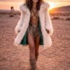 ZEVQ premium faux fur hooded festival duster coat with emerald satin lining, worn at a festival.