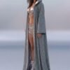 Model wearing a custom holographic silver festival duster kimono at a festival, showcasing its reflective, light-shifting properties.