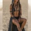 ZEVQ Owl Oracle Black Linen Hooded Duster worn at a festival, showcasing the shamanic back print and flowing silhouette.