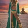 ZEVQ premium emerald sequin festival cloak with dramatic white faux fur trim, worn at a festival.