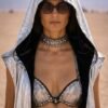 ZEVQ premium metallic silver hooded maxi vest worn at a futuristic festival