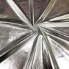 ZEVQ premium metallic silver hooded maxi vest worn at a futuristic festival