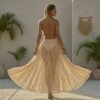 ZEVQ premium ecru lace maxi festival skirt with double front slits, worn at a festival.