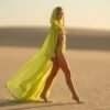 ZEVQ Neon Green Sheer Chiffon Duster with gold trim, a luxury festival cape for rave and cyberpunk fashion.